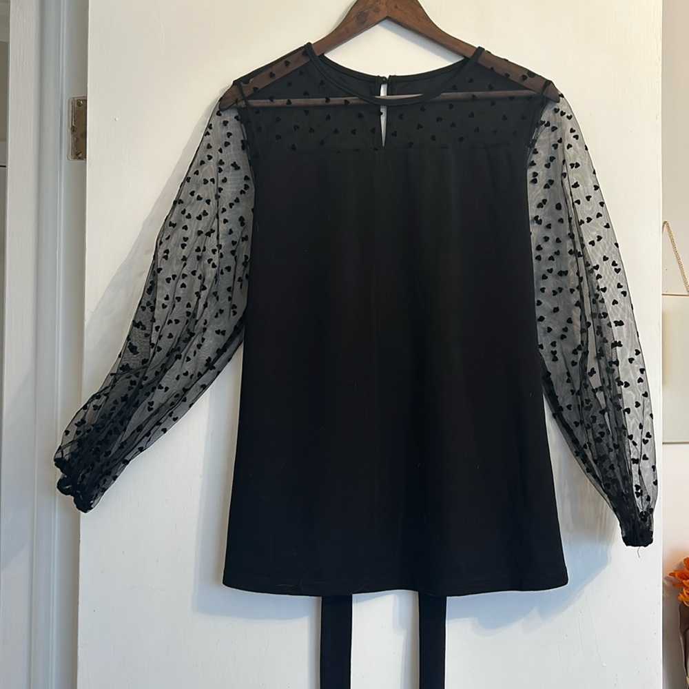 Black Blouse with heart sheer sleeves and waist tie size L/XL never worn